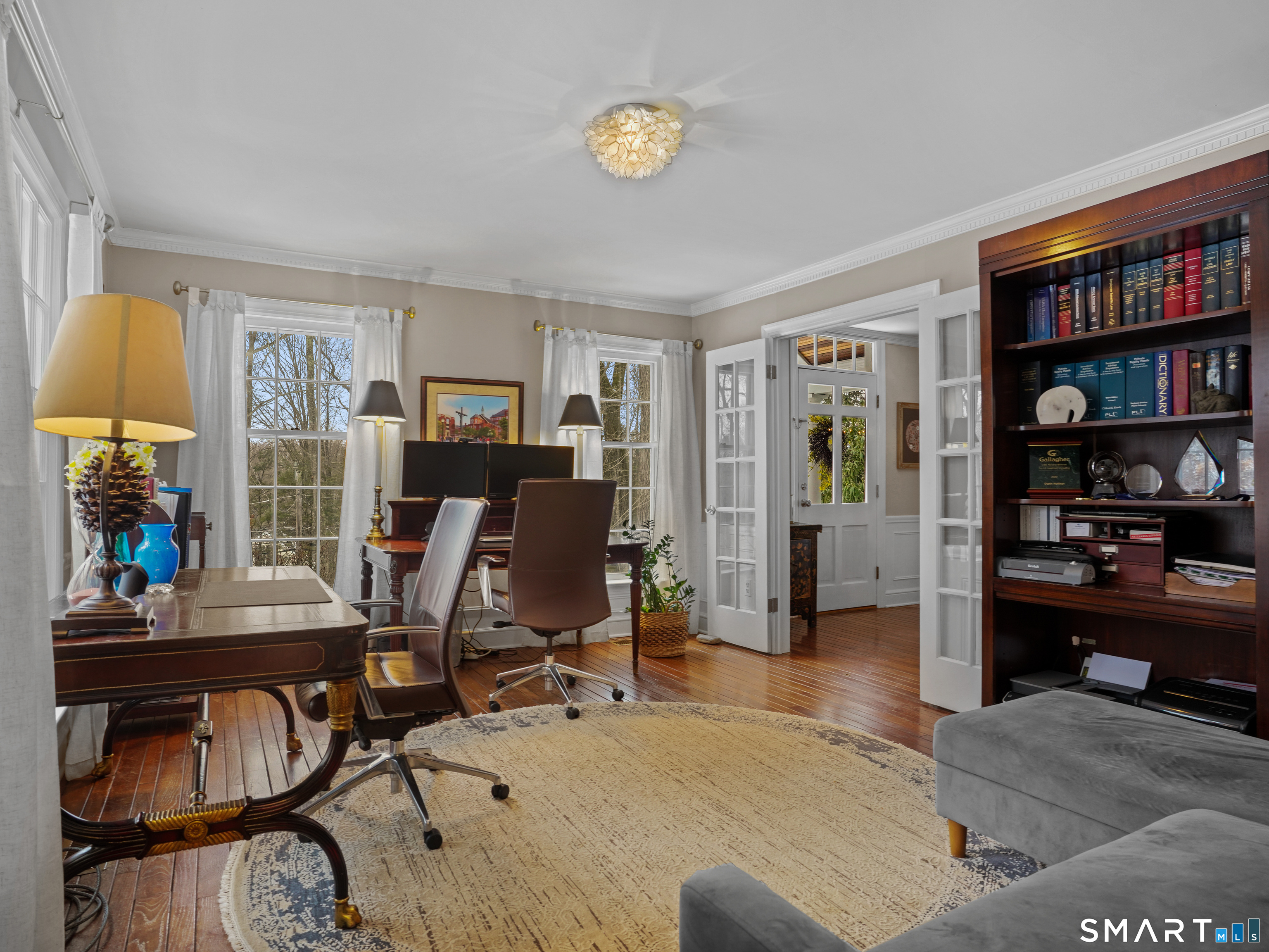 250 Ivy Hill Road Ridgefield, CT 06877 - Photo 24 of 45 a view of a livingroom with workspace and a couch