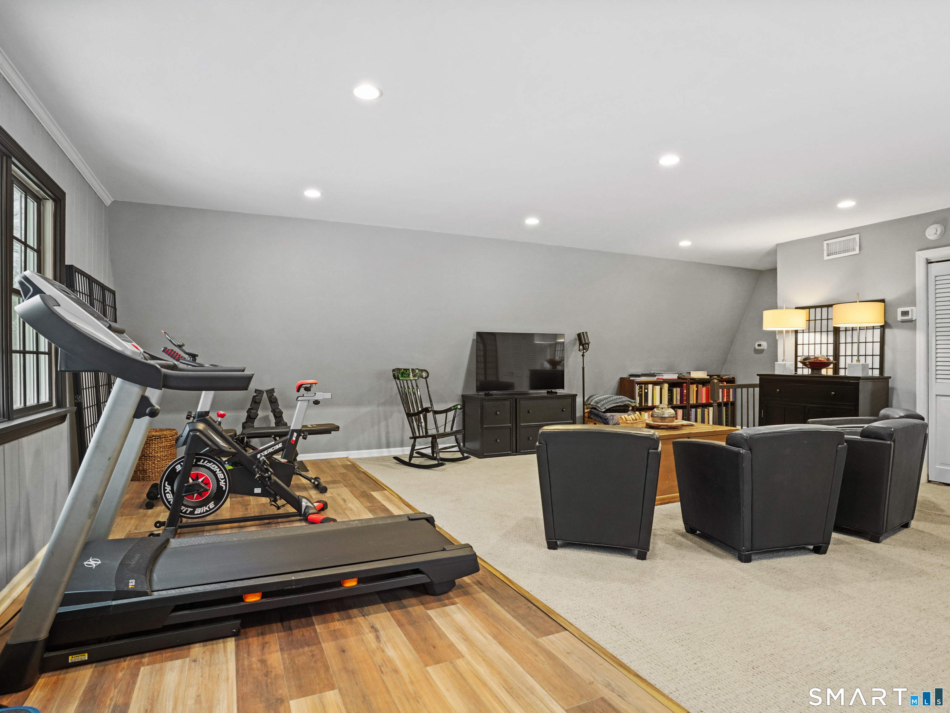 250 Ivy Hill Road Ridgefield, CT 06877 - Photo 25 of 45 a living room with furniture and a flat screen tv