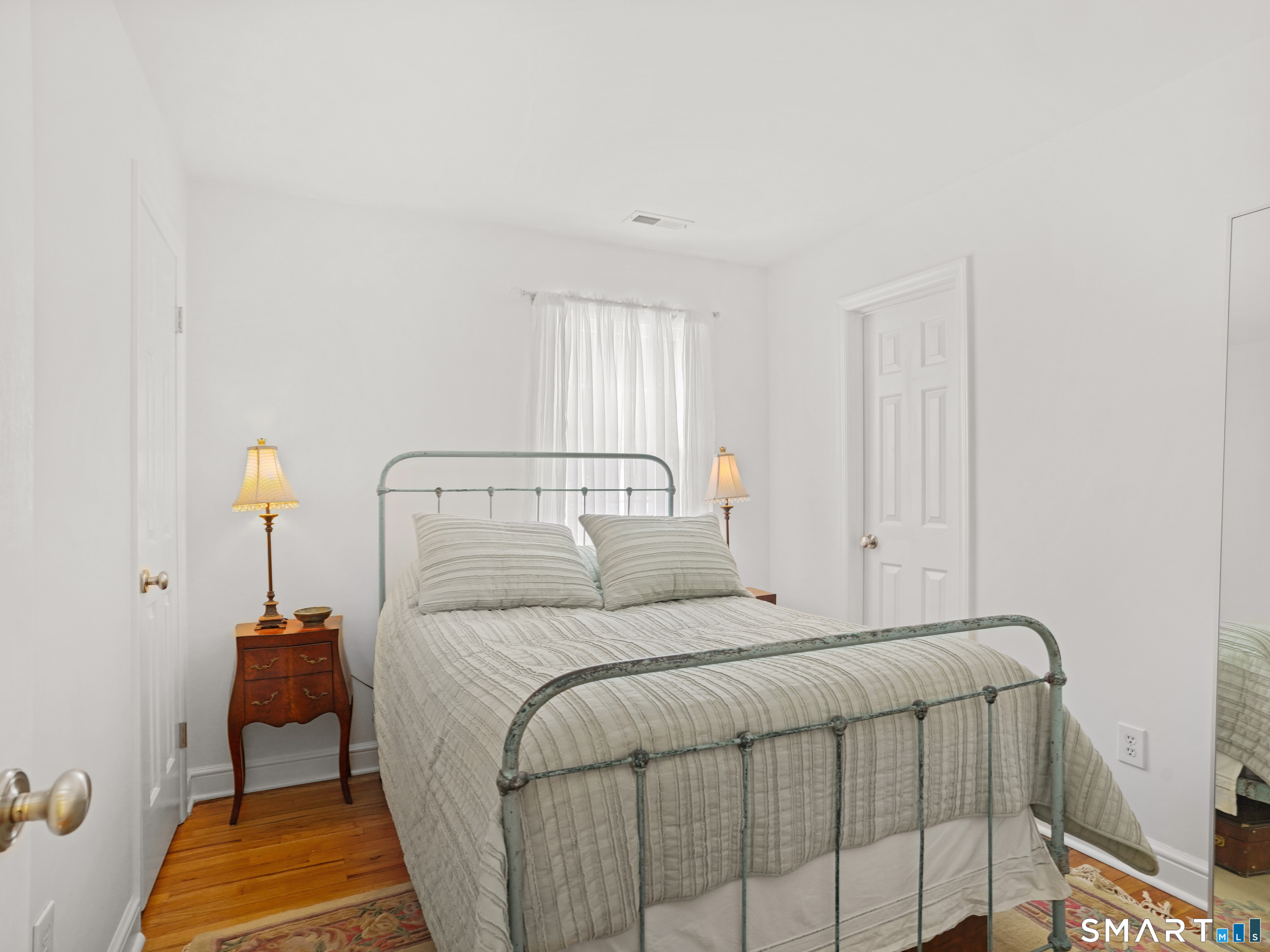 250 Ivy Hill Road Ridgefield, CT 06877 - Photo 27 of 45 a bedroom with a bed and a window