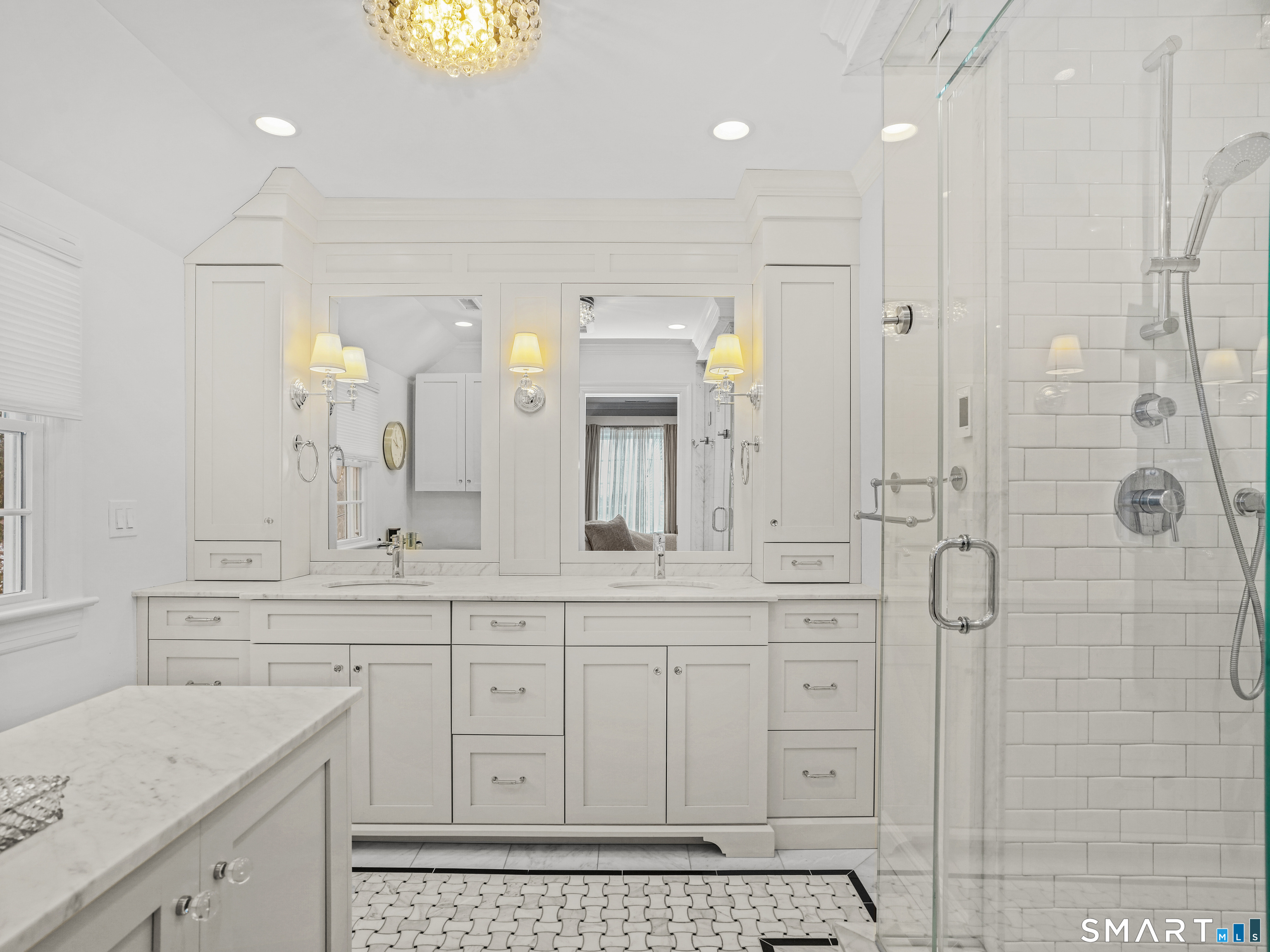 250 Ivy Hill Road Ridgefield, CT 06877 - Photo 30 of 45 a bathroom with a shower a sink and a mirror