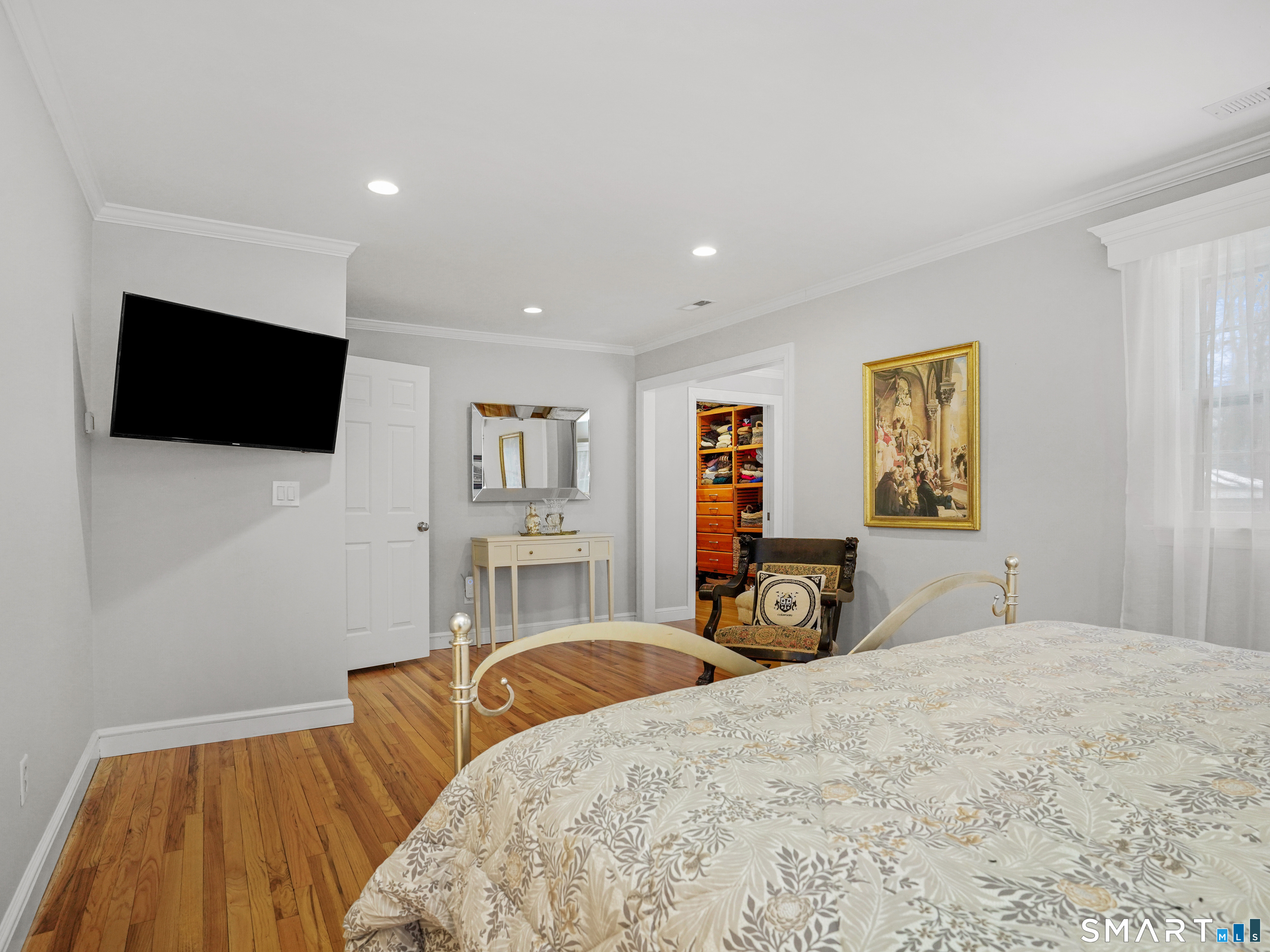 250 Ivy Hill Road Ridgefield, CT 06877 - Photo 31 of 45 a bedroom with a bed and a flat screen tv