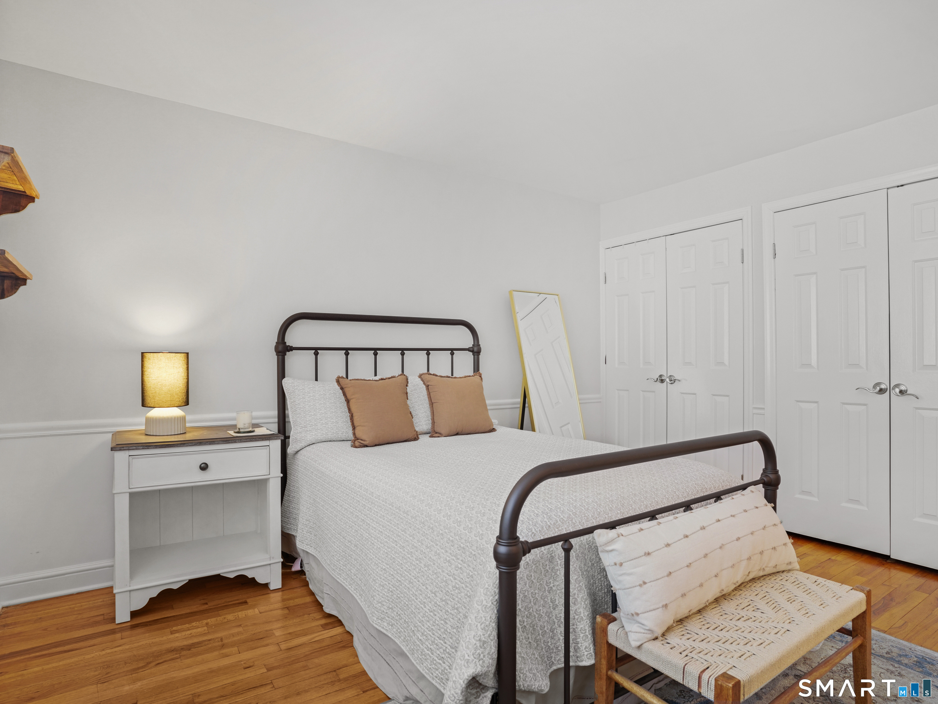 250 Ivy Hill Road Ridgefield, CT 06877 - Photo 34 of 45 a bedroom with a bed and lamps