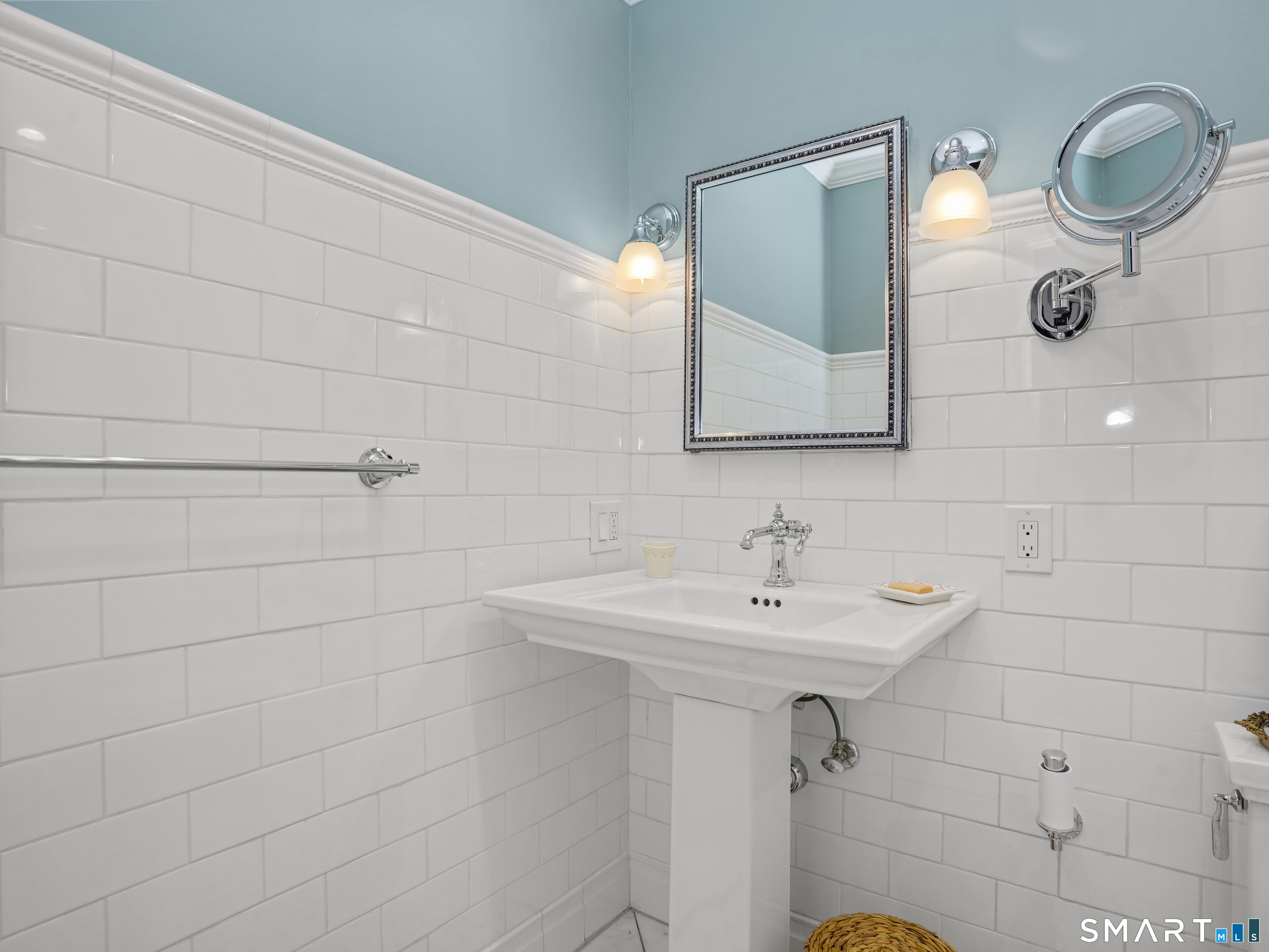 250 Ivy Hill Road Ridgefield, CT 06877 - Photo 36 of 45 a bathroom with a sink a toilet and mirror