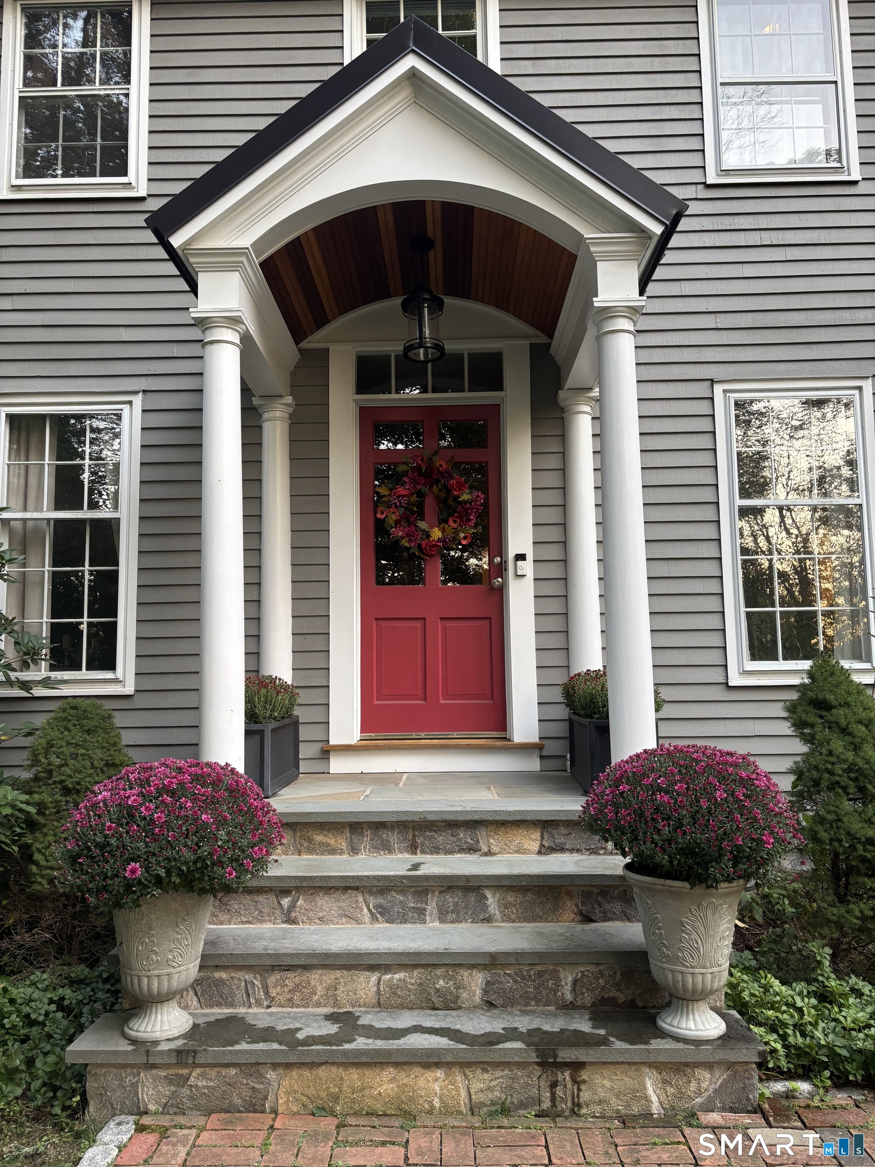 250 Ivy Hill Road Ridgefield, CT 06877 - Photo 4 of 45 a front view of a house
