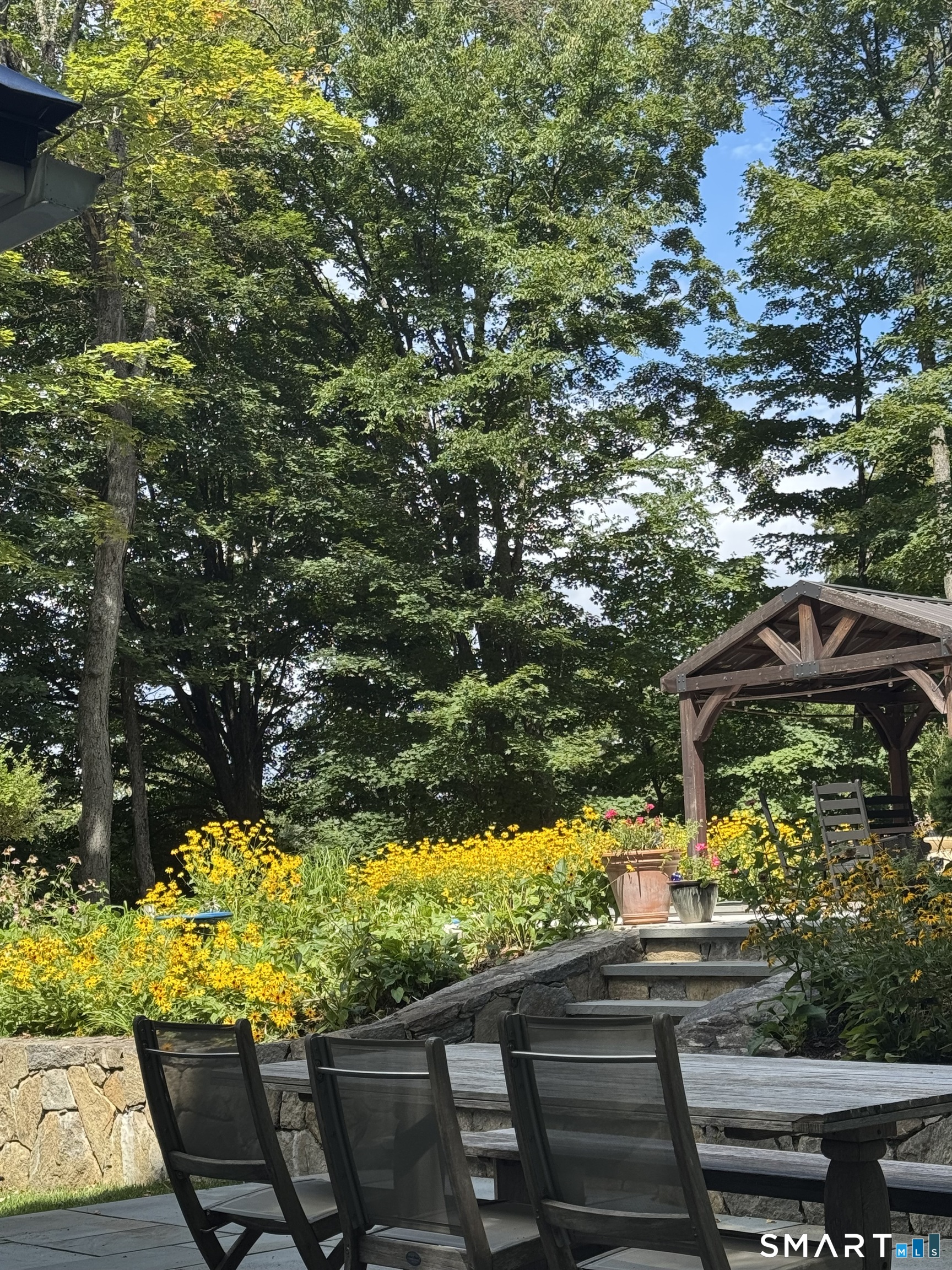 250 Ivy Hill Road Ridgefield, CT 06877 - Photo 9 of 45 a view of a yard with plants