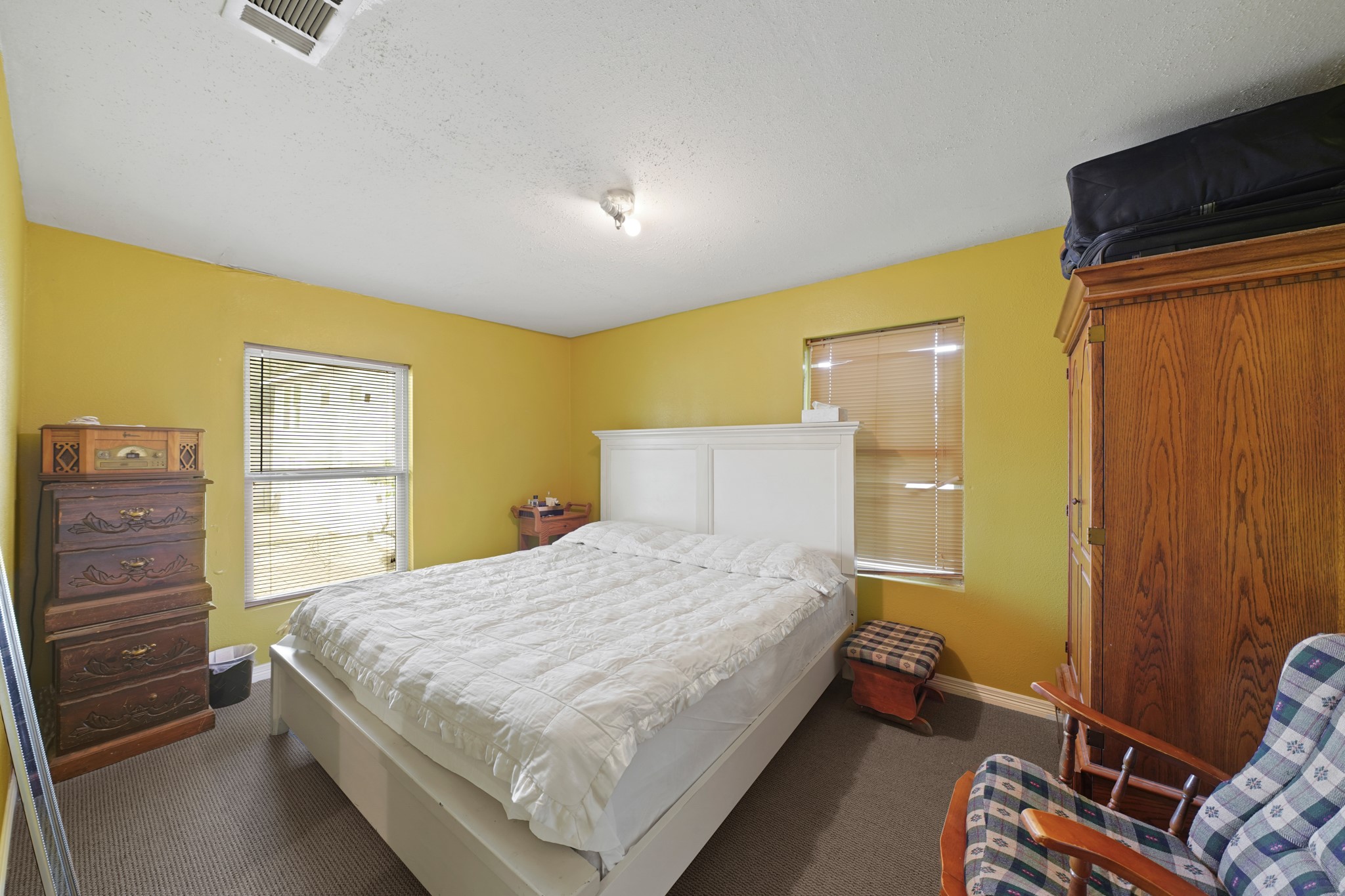 5307 Crane Street Houston, TX 77026 - Photo 40 of 41 a bedroom with a bed and furniture