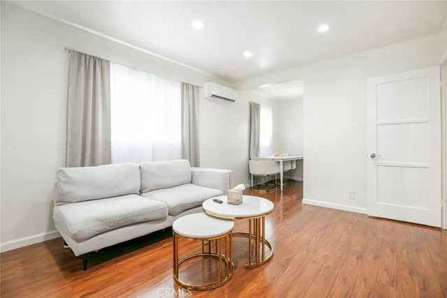 a kitchen with a sink appliances and cabinets