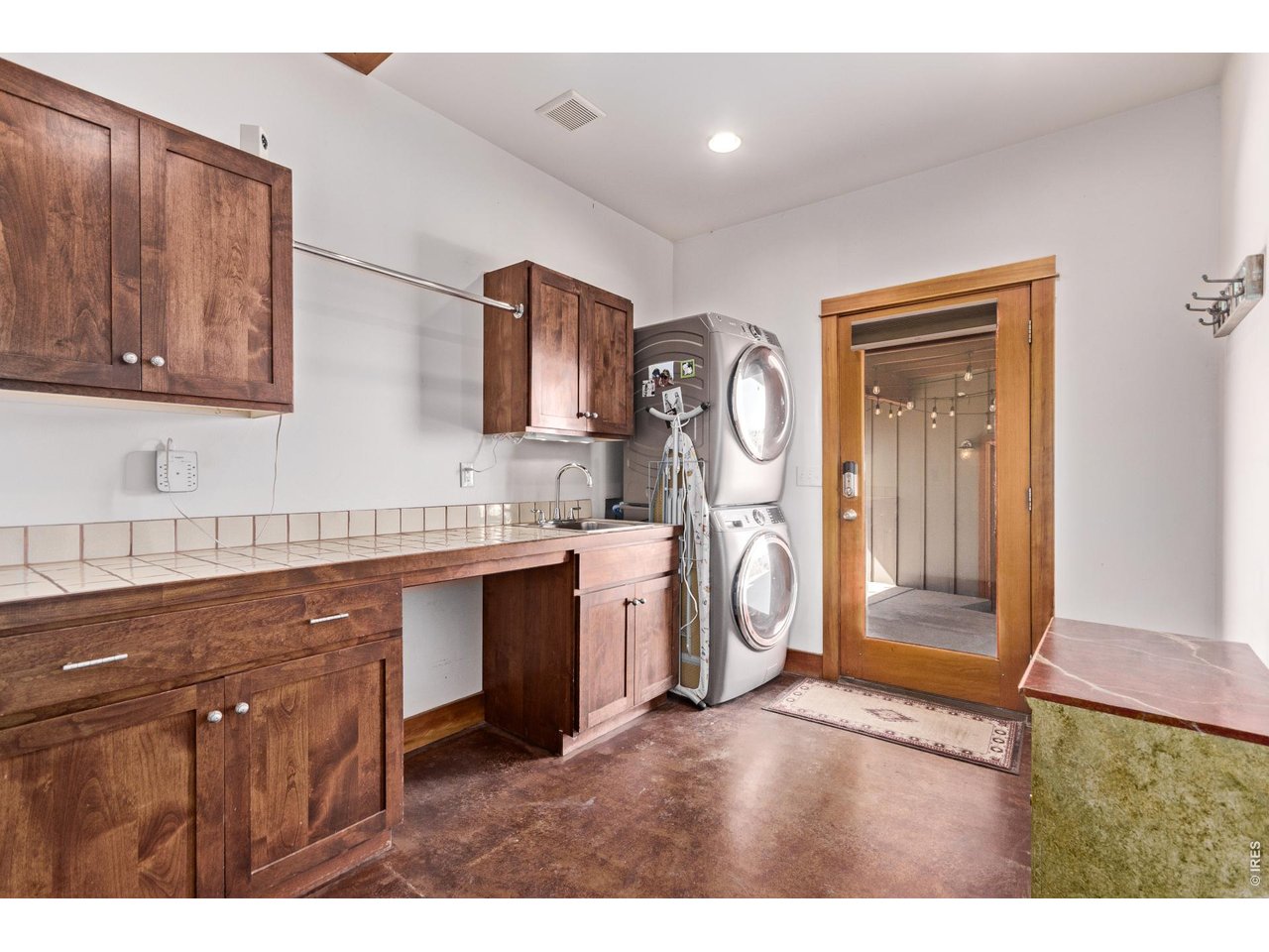 399 Northview Road Berthoud, CO 80513 - Photo 35 of 39 Mudroom and First laundry with plenty of storage room