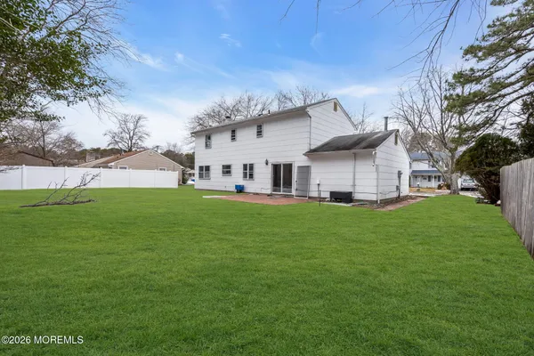 a view of a house with a big yard