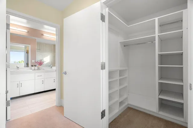a view of cabinets and closet