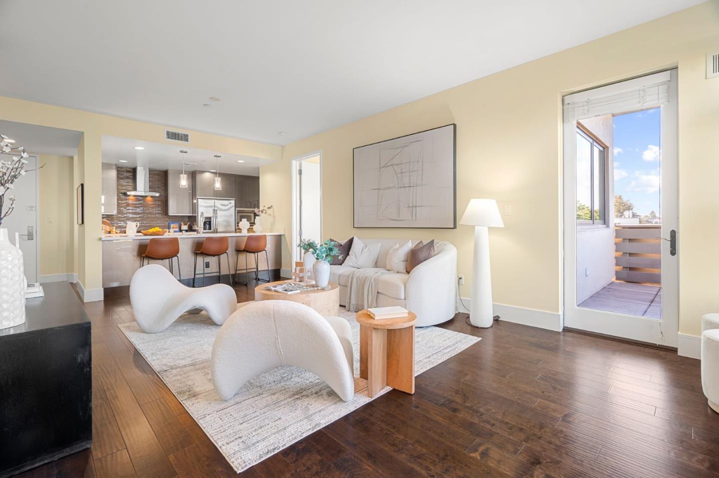 1838 Ogden Drive, Unit 413 Burlingame, CA 94010 - Photo 6 of 23 a living room with furniture and wooden floor