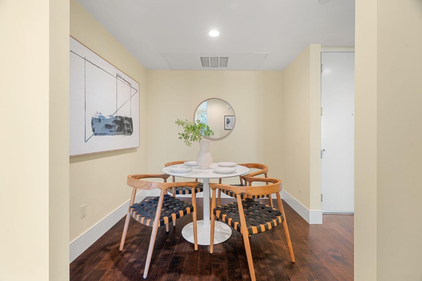 1838 Ogden Drive, Unit 413 Burlingame, CA 94010 - Photo 7 of 23 a view of a dining room with furniture and wooden floor