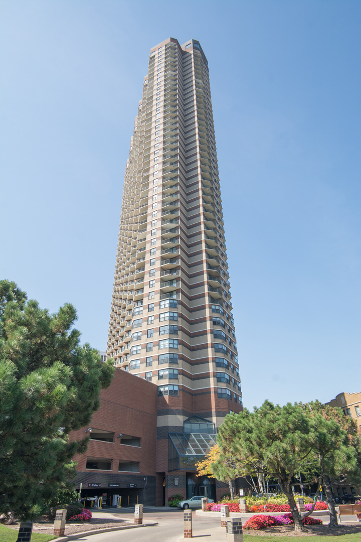 3660 North Lake Shore Drive, Unit 3910 Chicago, IL 60613 - Photo 1 of 25 a front view of a building