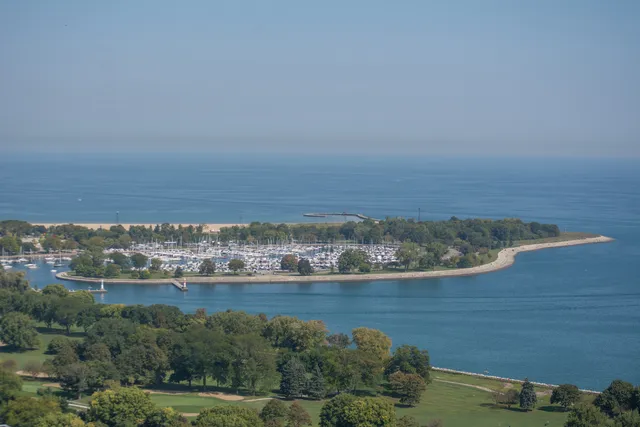 a kitchen with a sink cabinets and appliances