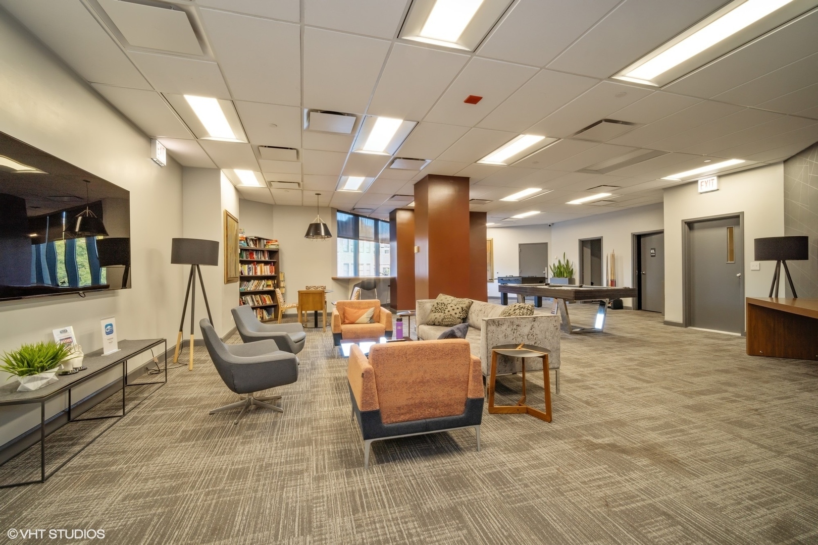 3660 North Lake Shore Drive, Unit 3910 Chicago, IL 60613 - Photo 19 of 25 a living room with lots of furniture and a view of kitchen