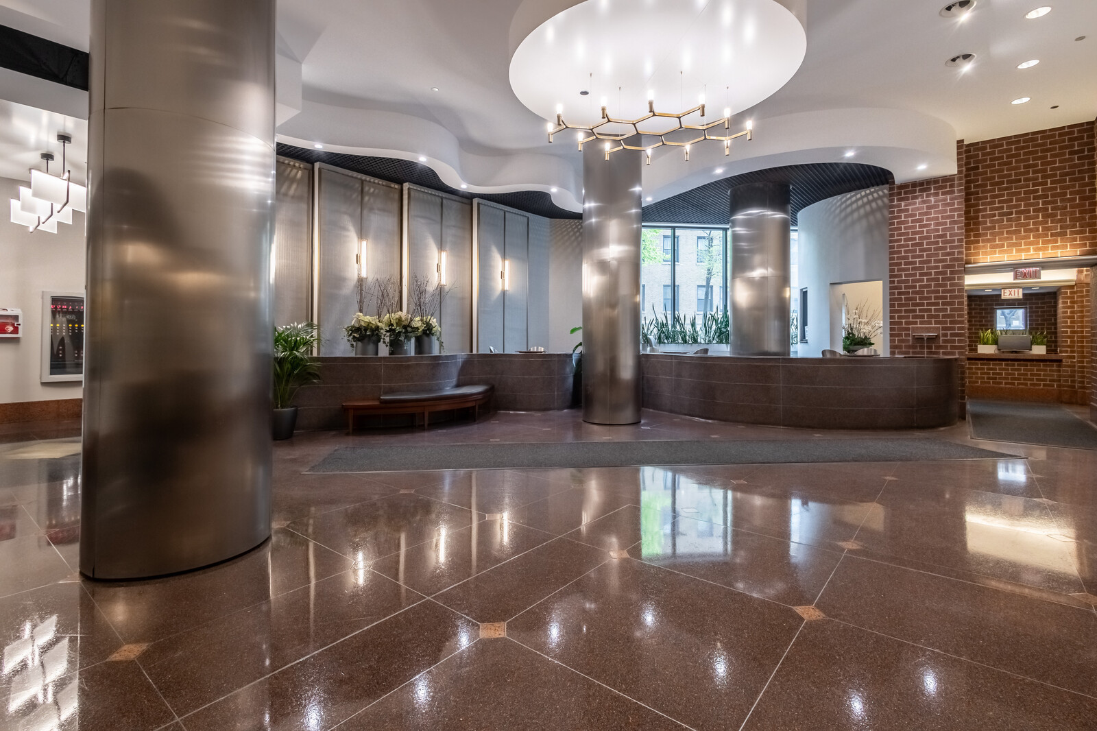 3660 North Lake Shore Drive, Unit 3910 Chicago, IL 60613 - Photo 6 of 25 a large living room with a chandelier