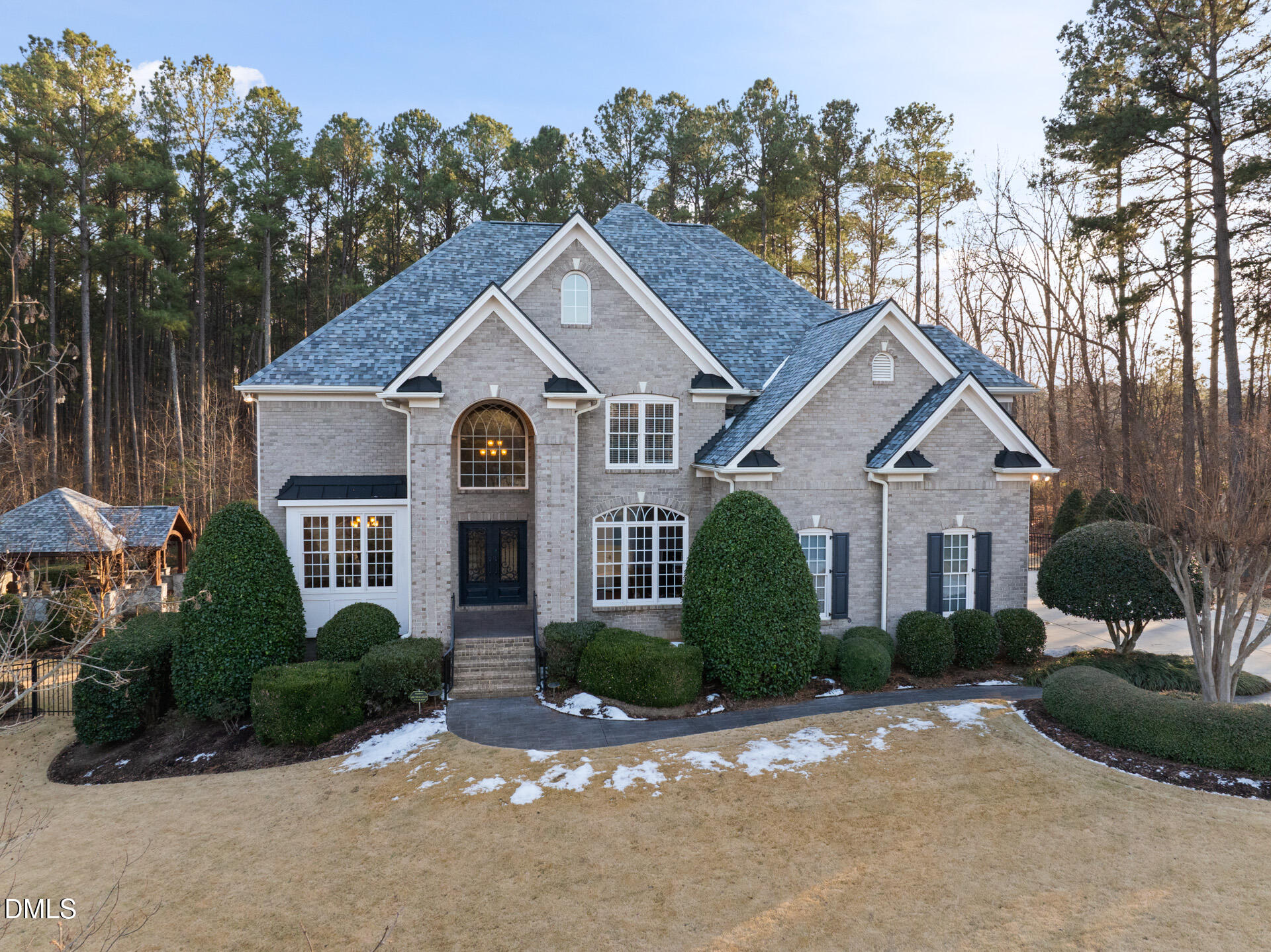 112 Winding Ridge Road Durham, NC 27713 - Photo 2 of 84 a front view of a house with a yard and potted plants