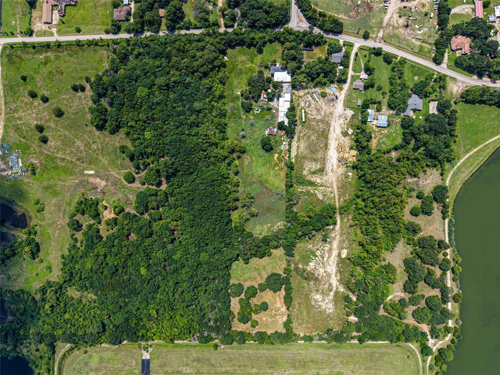 1900 Haymarket Road Dallas, TX 75253 - Photo 11 of 20 Expansive property featuring significant wooded areas and cleared land