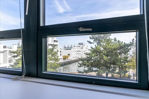 a view of a hallway with closet