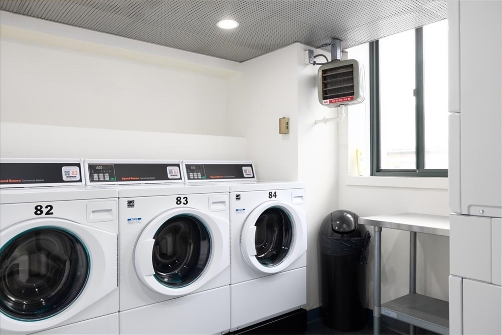 42 8th Street, Unit 5316 Boston, MA 02129 - Photo 17 of 39 a utility room with dryer and washer