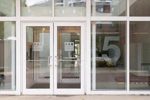 a potted plant sitting in front of a door