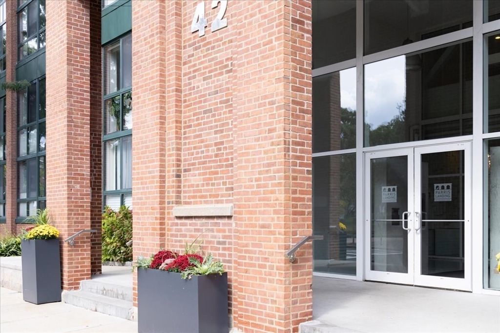 42 8th Street, Unit 5316 Boston, MA 02129 - Photo 28 of 39 a potted plant sitting in front of a door