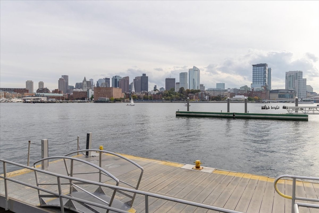 42 8th Street, Unit 5316 Boston, MA 02129 - Photo 35 of 39 a view of a lake with tall buildings