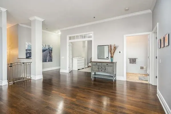 a kitchen with stainless steel appliances a refrigerator and a sink