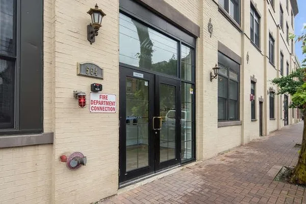 a view of a building and a street
