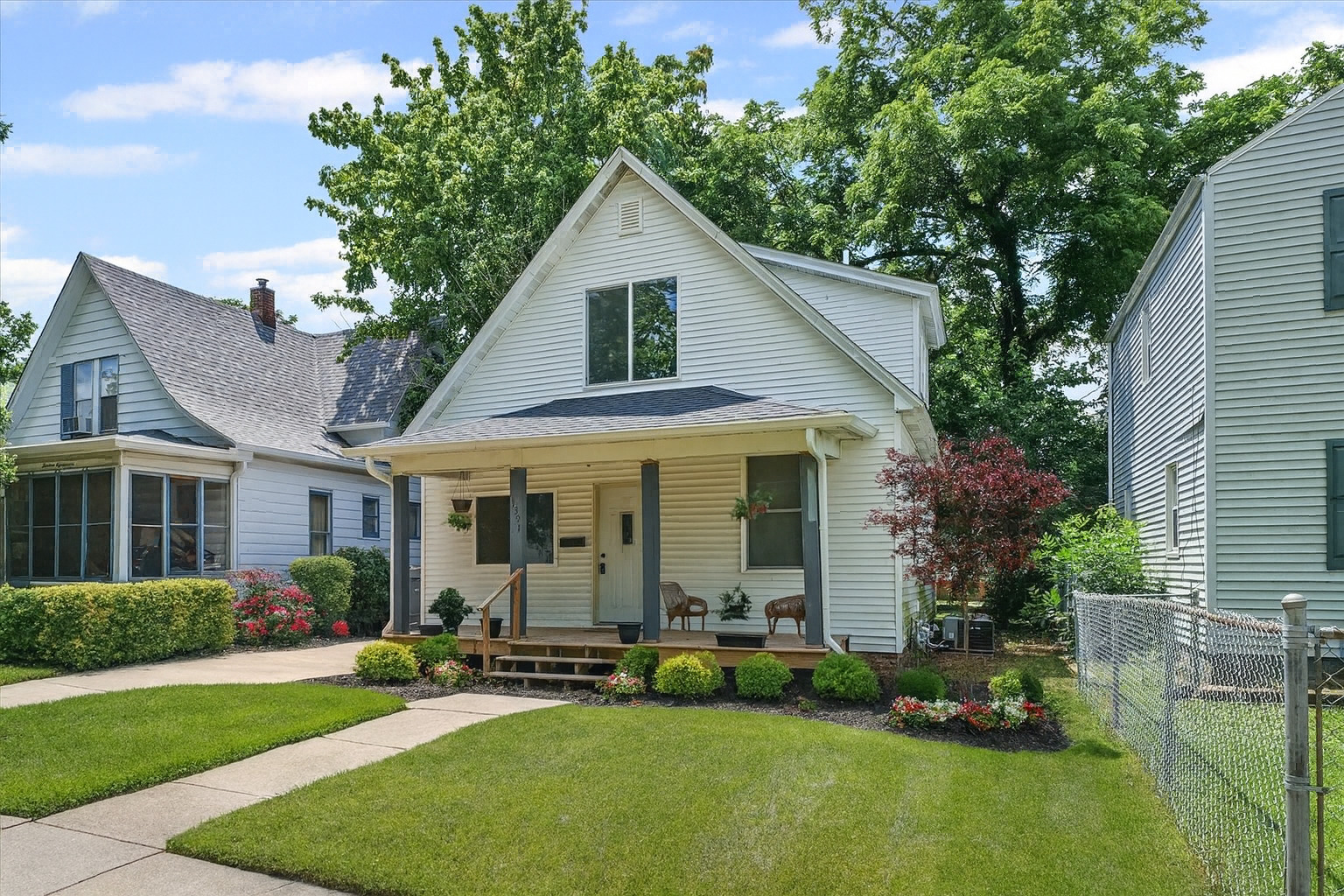 1391 West Decatur Street Decatur, IL 62522 - Photo 1 of 28 a view of a chair and table in backyard of the house