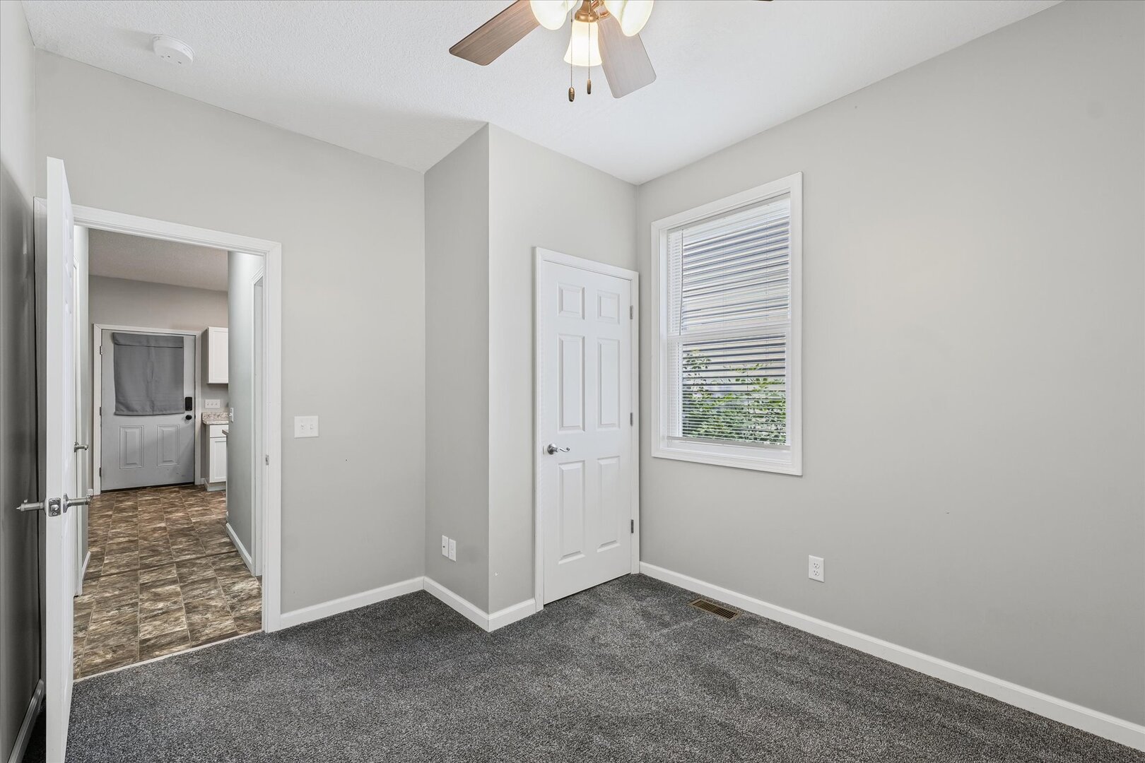 1391 West Decatur Street Decatur, IL 62522 - Photo 15 of 28 wooden floor in an empty room with a window