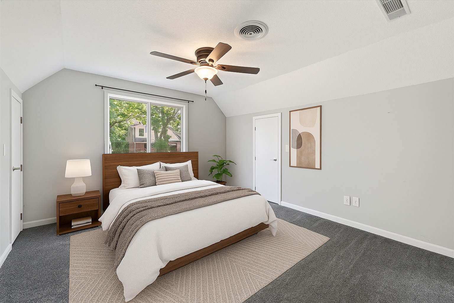 1391 West Decatur Street Decatur, IL 62522 - Photo 17 of 28 a bedroom with a bed and a chandelier