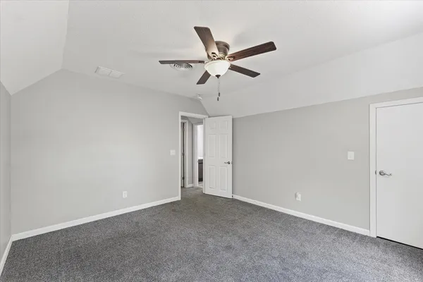 a view of a chandelier fan in a room