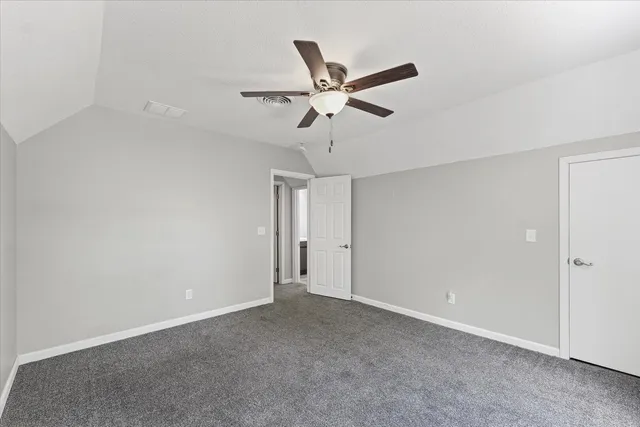 a view of a chandelier fan in a room