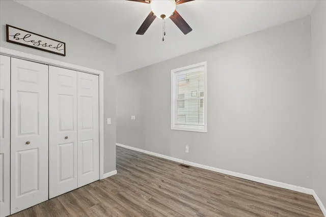 a view of entryway with wooden floor