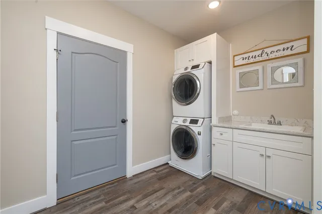 a view of a hallway with washer and dryer