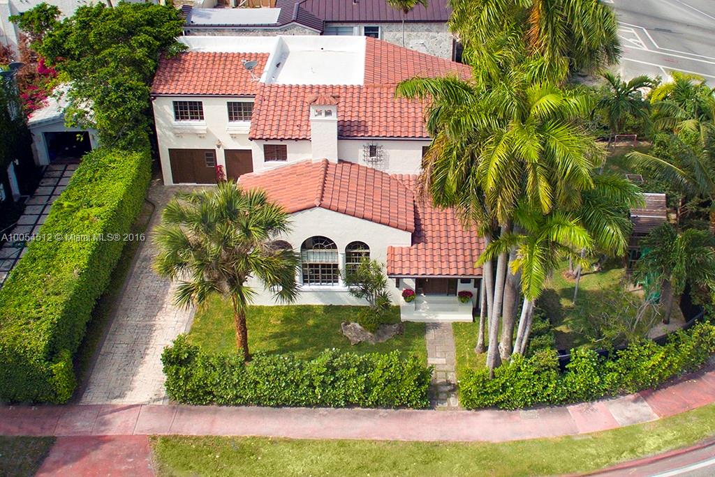 4236 Alton Road Miami Beach, FL 33140 - Photo 19 of 24 front view of a house with a yard