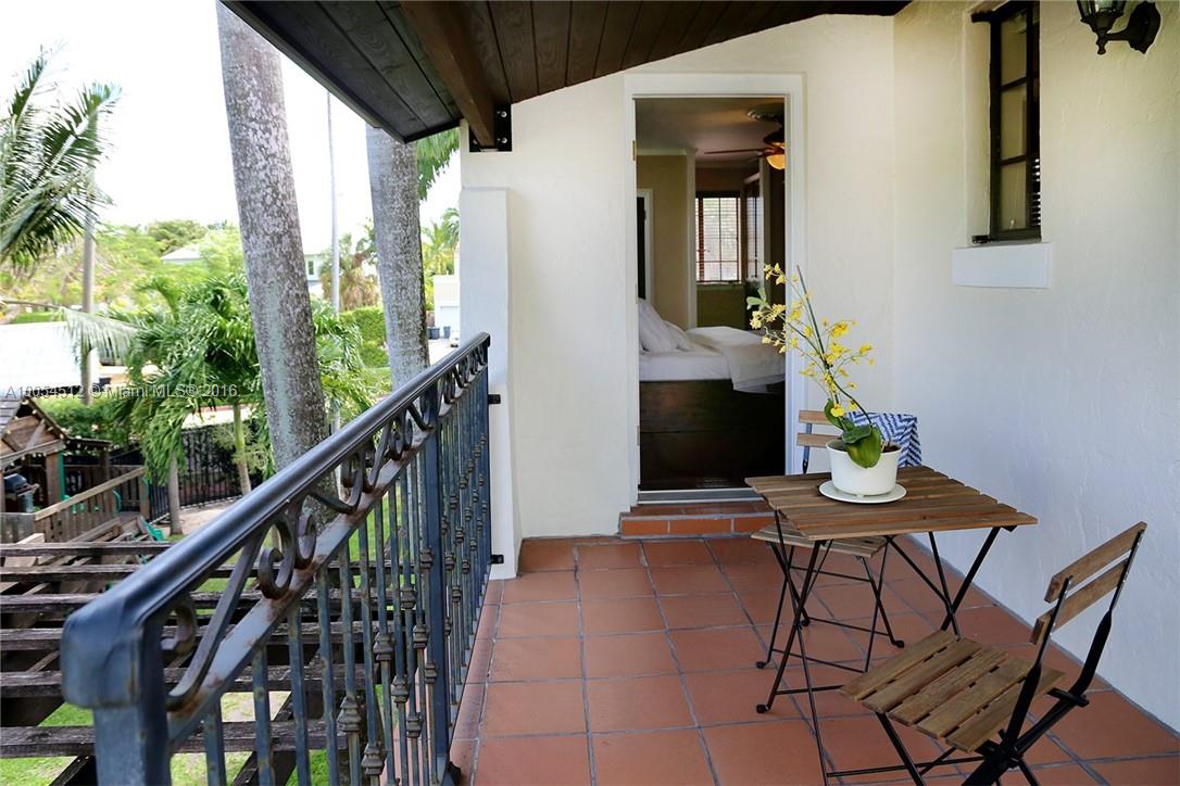 4236 Alton Road Miami Beach, FL 33140 - Photo 24 of 24 a view of balcony and wooden floor