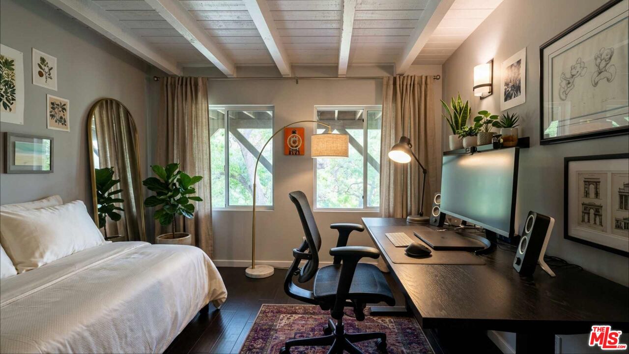 19562 Cave Way Topanga, CA 90290 - Photo 19 of 29 a bedroom with furniture bed and wooden floor