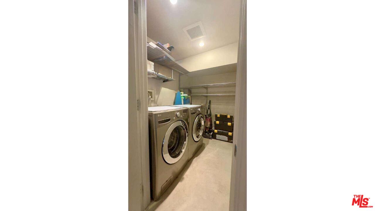 19562 Cave Way Topanga, CA 90290 - Photo 22 of 29 a utility room with dryer and washer