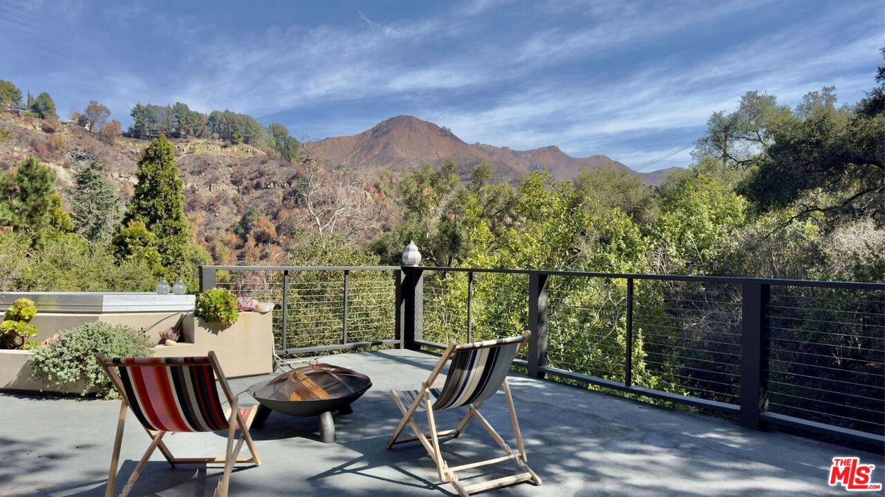 19562 Cave Way Topanga, CA 90290 - Photo 24 of 29 a view of a balcony with furniture
