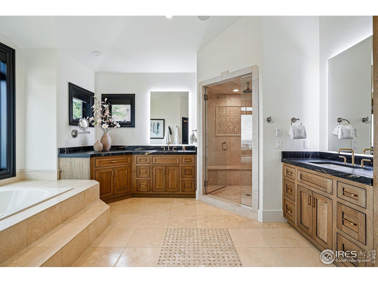 166 Valley View Way Boulder, CO 80304 - Photo 21 of 40 a kitchen with stainless steel appliances kitchen island granite countertop a sink and cabinets