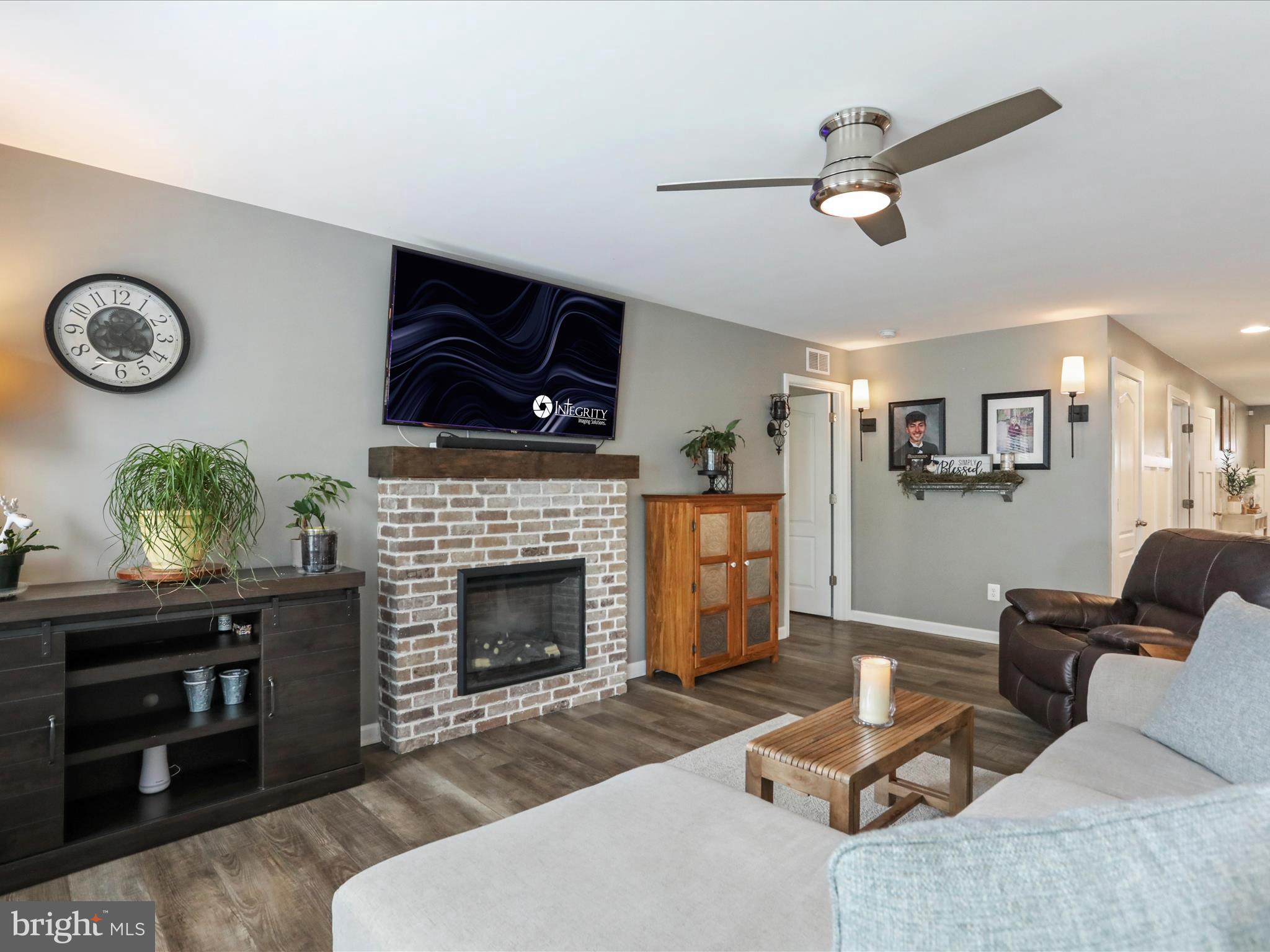 164 Stager Avenue Falling Waters, WV 25419 - Photo 15 of 46 a living room with furniture and a fireplace