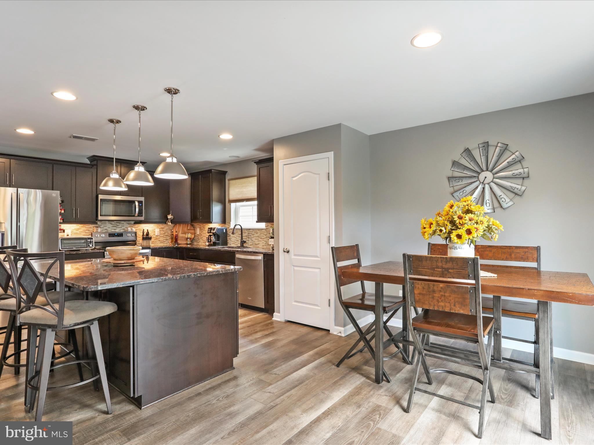 164 Stager Avenue Falling Waters, WV 25419 - Photo 17 of 46 a kitchen with a table and chairs in it