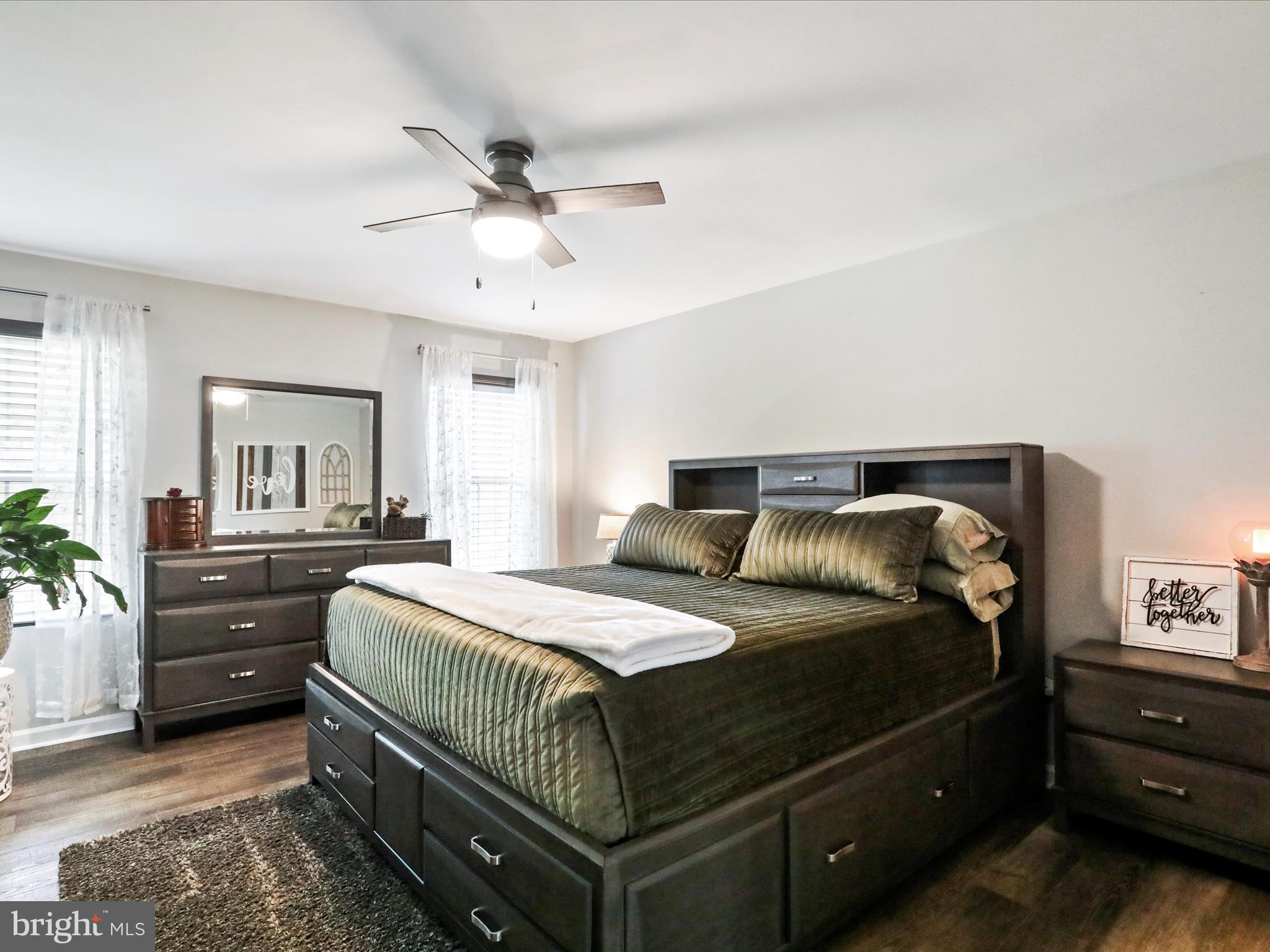 164 Stager Avenue Falling Waters, WV 25419 - Photo 22 of 46 a bedroom with a bed and a chandelier