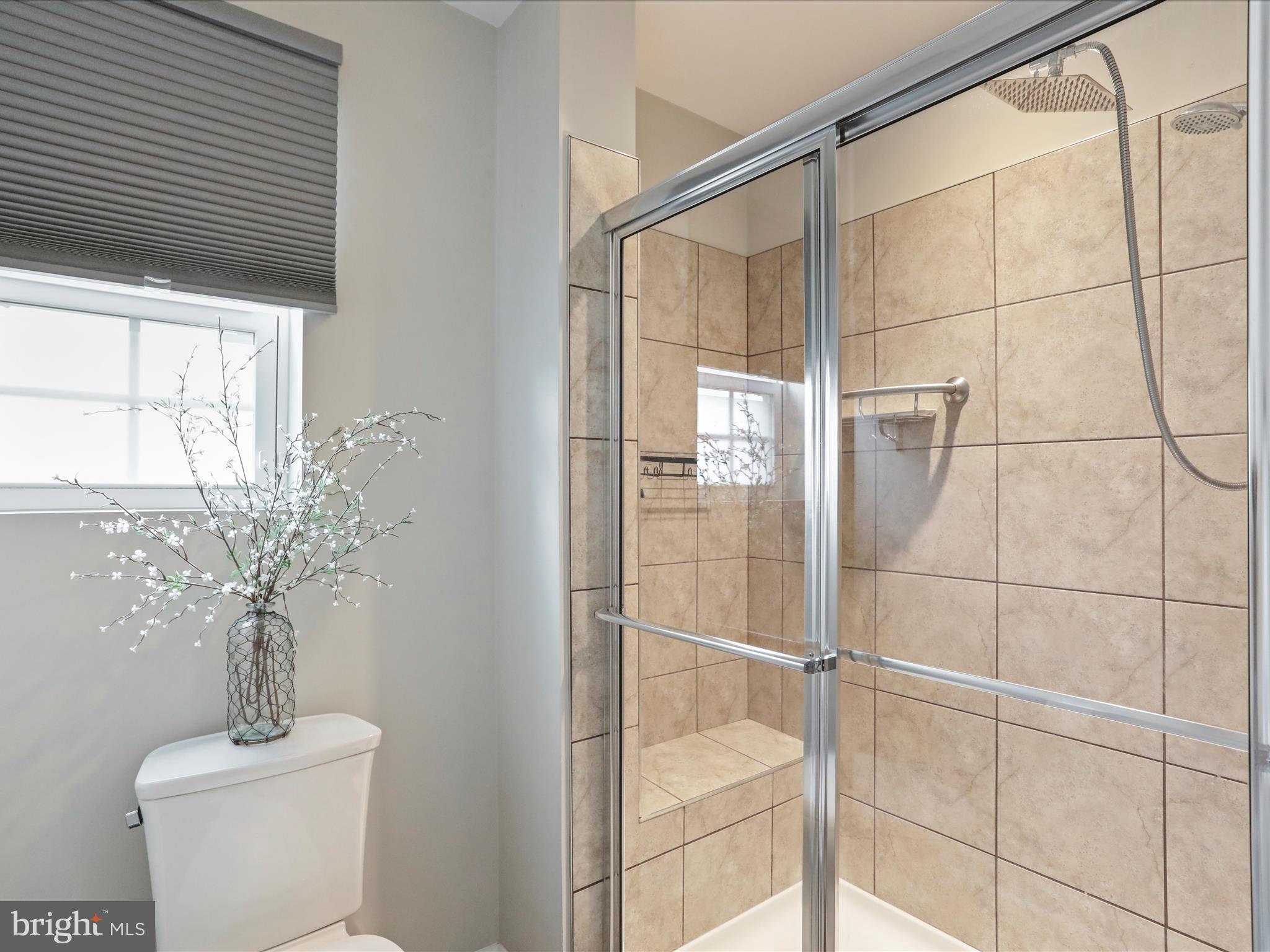 164 Stager Avenue Falling Waters, WV 25419 - Photo 27 of 46 a bathroom with a toilet and shower