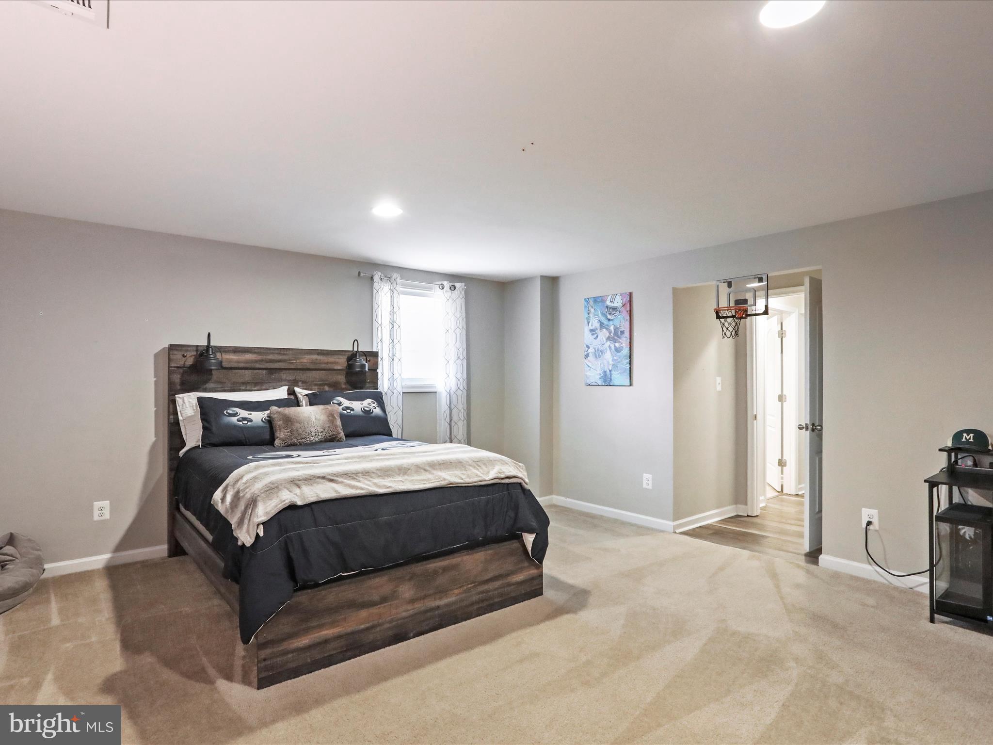 164 Stager Avenue Falling Waters, WV 25419 - Photo 36 of 46 a bedroom with a bed and a couch