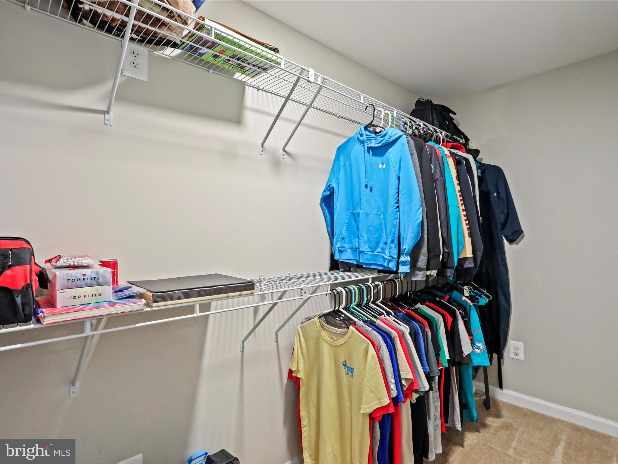 164 Stager Avenue Falling Waters, WV 25419 - Photo 38 of 46 a view of walk in closet with clothes and shoes