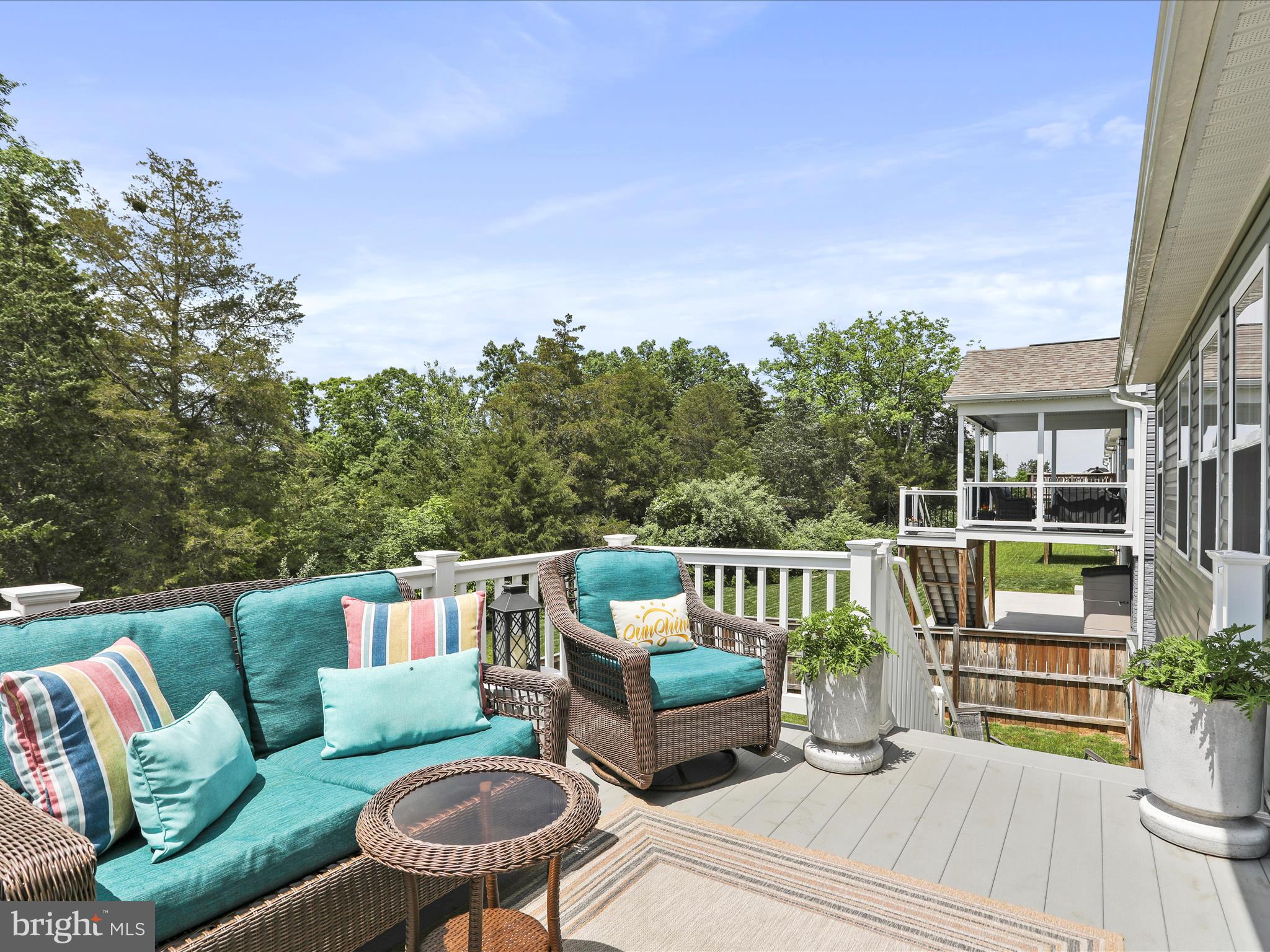 164 Stager Avenue Falling Waters, WV 25419 - Photo 43 of 46 a roof deck with couches and wooden fence