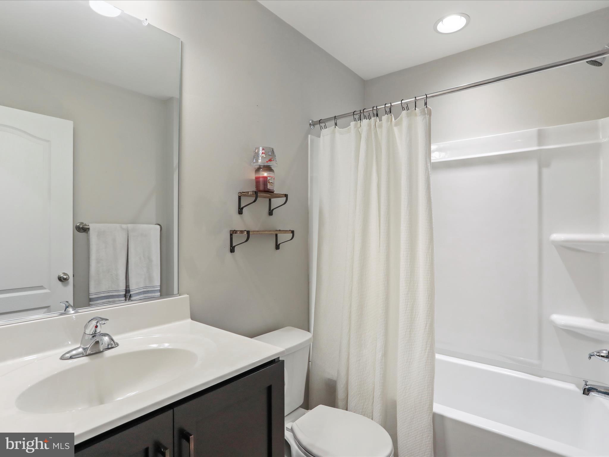 164 Stager Avenue Falling Waters, WV 25419 - Photo 9 of 46 a bathroom with a sink toilet and shower